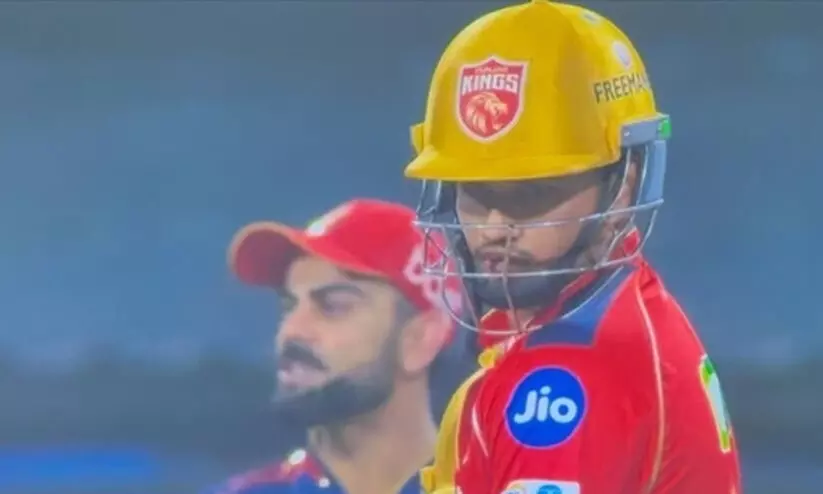 വാട്ടർ ബോയ്! ആദ്യ ഐ.പി.എൽ മത്സരം കളിക്കാനിറങ്ങിയ യുവതാരത്തെ അധിക്ഷേപിച്ച് കോഹ്ലി? സമൂഹമാധ്യമങ്ങളിൽ രൂക്ഷവിമർശനം -വിഡിയോ