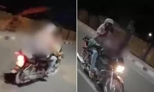 ആഗ്ര-കാൺപൂർ ഹൈവേയിൽ ​ഹെൽമറ്റില്ലാതെ ബൈക്കിൽ ദമ്പതികളുടെ അഭ്യാസ പ്രകടനം -വിഡിയോ