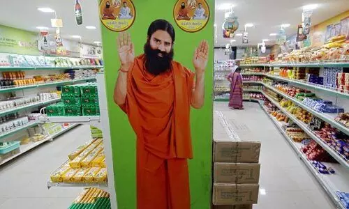 ഡാബറിനെ ഇകഴ്ത്തി പരസ്യം: പതഞ്ജലിക്ക് ഹൈകോടതി വിലക്ക്