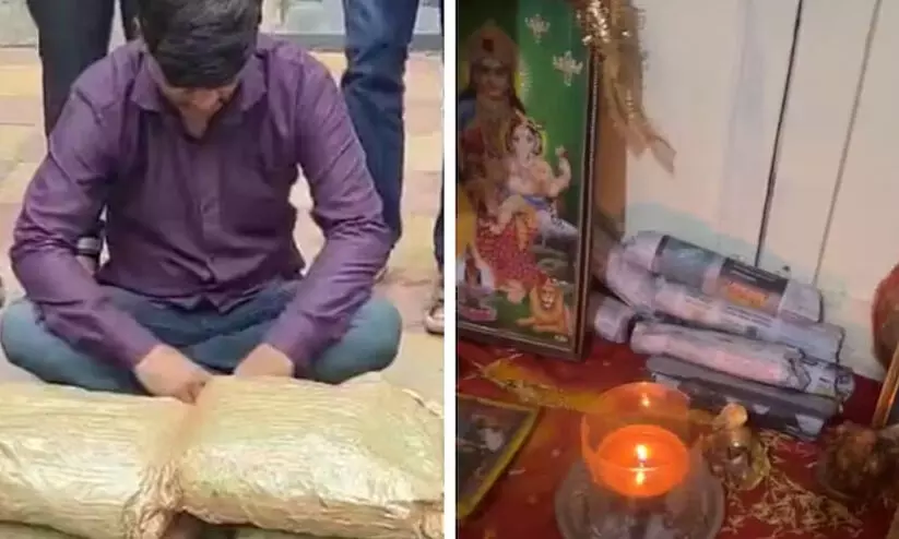 ദൈവത്തിന്റെ ഛായാചിത്രങ്ങൾക്ക് പിന്നിൽ കഞ്ചാവ് ഒളിപ്പിച്ചു, സംശയം തോന്നാതിരിക്കാൻ പൂജ നടത്തി: യുവാവ് അറസ്റ്റിൽ