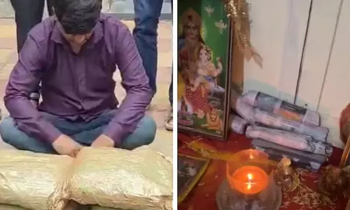 ദൈവത്തിന്റെ ഛായാചിത്രങ്ങൾക്ക് പിന്നിൽ കഞ്ചാവ് ഒളിപ്പിച്ചു, സംശയം തോന്നാതിരിക്കാൻ പൂജ നടത്തി: യുവാവ് അറസ്റ്റിൽ