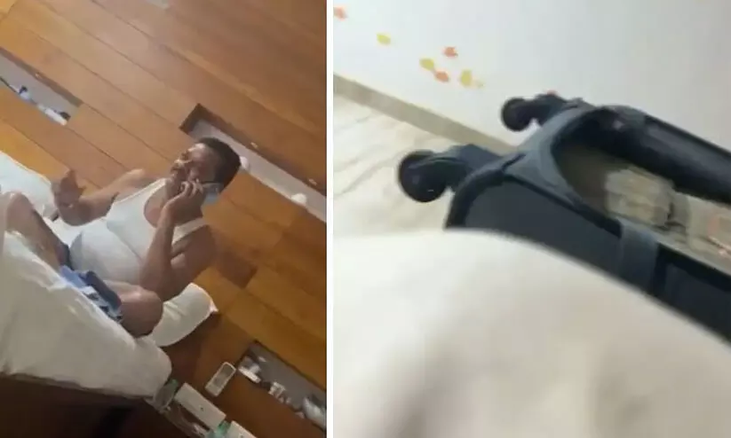 ആദായനികുതി നോട്ടീസിന് പിന്നാലെ പണമടങ്ങിയ ബാഗിന് മുന്നിലിരുന്ന് സിഗരറ്റ് വലിച്ച് മഹാരാഷ്ട്ര മന്ത്രി; വിഡിയോയുമായി റാവത്ത്