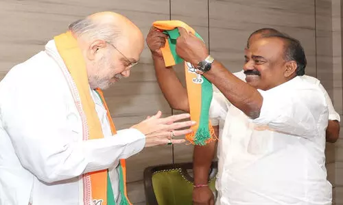 മുൻ എ.ഐ.സി.സി അംഗം എൻ.കെ സുധീർ ബി.ജെ.പിയിൽ