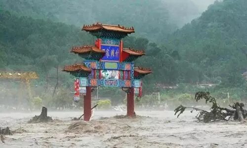 ചൈനയിൽ കനത്ത മഴ തുടരുന്നു; പേമാരിയിൽ 30 മരണം,   11 പ്രവിശ്യകളിൽ വെള്ളപ്പൊക്ക മുന്നറിയിപ്പ്