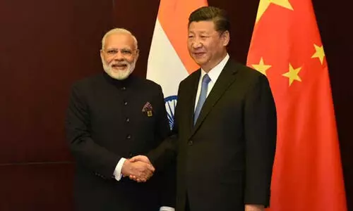 PM Modi with Chinese president Xi Jinping PM Modi with Chinese president Xi Jinping