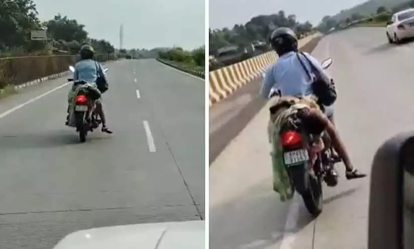 അപകടത്തിൽ ഭാര്യ മരിച്ചു, സഹായിക്കാൻ ആരുമെത്തിയില്ല... ഒടുവിൽ മൃതദേഹം ബൈക്കിൽ കെട്ടിവെച്ച് യുവാവിന്റെ ‘മരണയാത്ര’; മനസാക്ഷി മരവിക്കും ഈ കാഴ്ച -വിഡിയോ