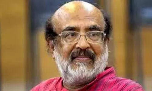 Dr. T.M. Thomas Isaac