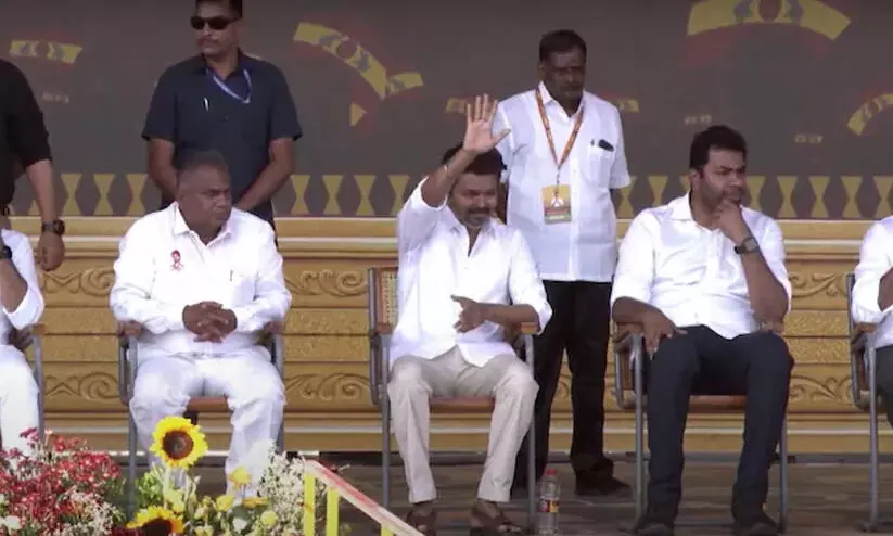 Vijay greeting the workers