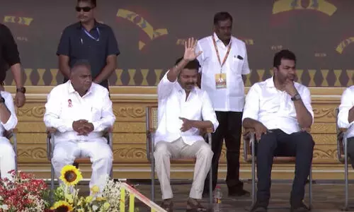 Vijay greeting the workers Vijay greeting the workers