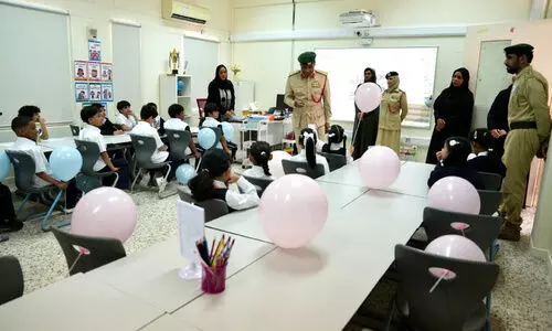Dubai Police officers visit classrooms and interact with children on the first day of school.