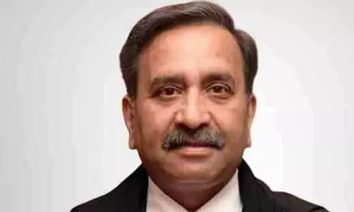Justice Sharad Kumar Sharma
