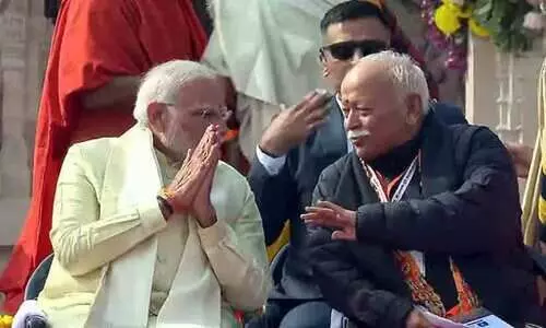 Mohan Bhagwat with PM Modi