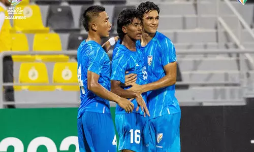 Muhammad Suhail (16) is congratulated by his teammates for scoring the goal Muhammad Suhail (16) is congratulated by his teammates for scoring the goal