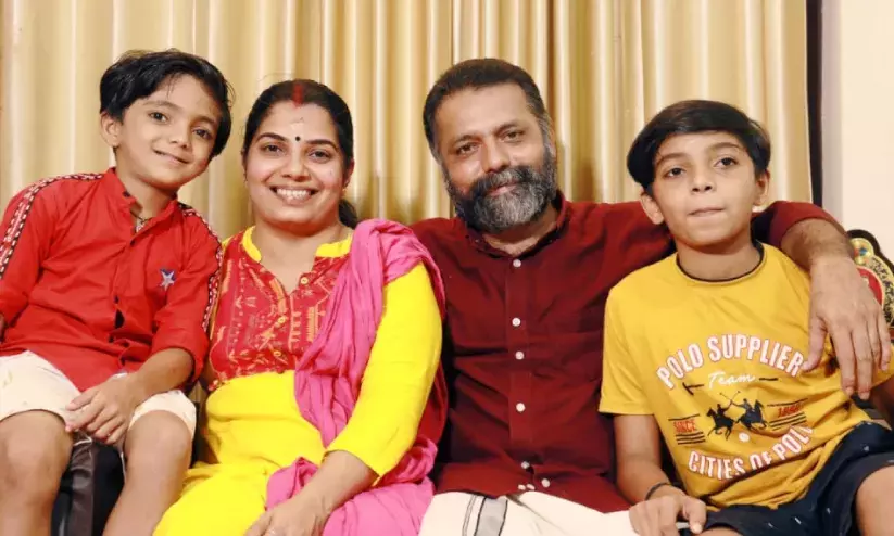 With his wife Dhanya and sons Devarajan Manoj and Jagad Manu