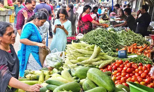 Rush at the vegetable market in Kannur city