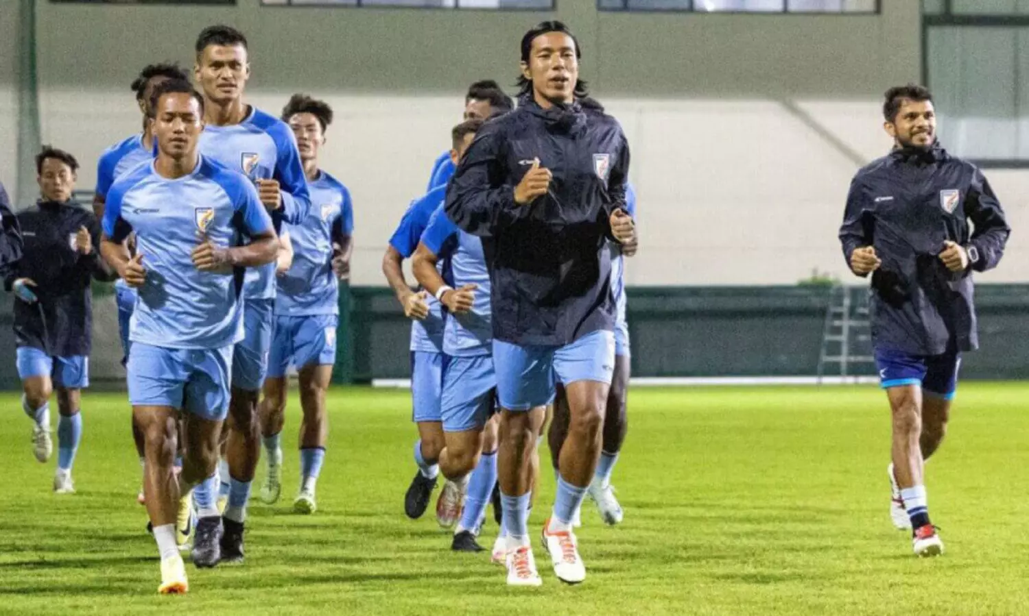 Players training before the match