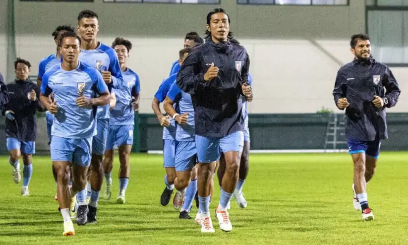 Players training before the match