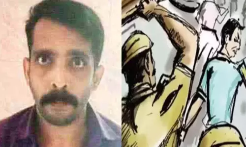 മരിക്കുകയാണെങ്കിൽ പാറക്കുളത്തിൽ തള്ളും, ജീവനുണ്ടെങ്കിൽ കേസെടുക്കും, മേശയുടെ മേൽ കിടത്തി വടികൊണ്ട് കാൽപത്തിയിലും തുടയിലും അടിച്ചു; ജോലിക്ക് പോകാനാകാതെ യുവാവ്