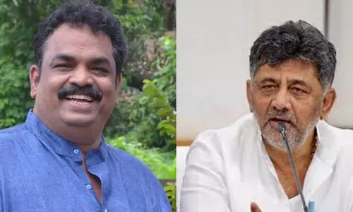 Satish Krishna Sail, D.K. Sivakumar