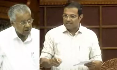 Roji M John and Pinarayi Vijayan