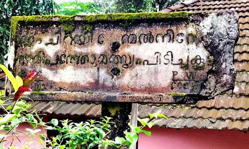 Old concrete board on the banks of the Kuhur River