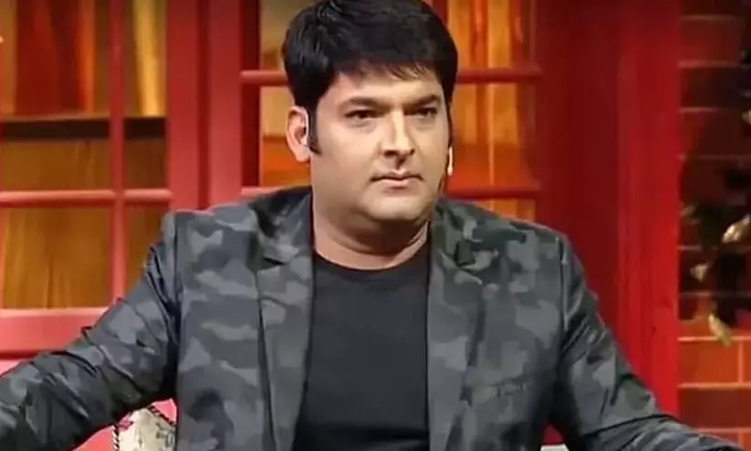 ഒരു കോടി രൂപ ആവശ്യപ്പെട്ട് കൊമേഡിയൻ കപിൽ ശർമക്ക് ഭീഷണി; പ്രതിയെ അറസ്റ്റ് ചെയ്തു ഒരു കോടി രൂപ ആവശ്യപ്പെട്ട് കൊമേഡിയൻ കപിൽ ശർമക്ക് ഭീഷണി; പ്രതിയെ അറസ്റ്റ് ചെയ്തു