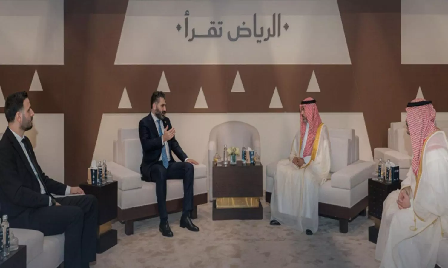 Syrian Minister of Culture Dr. Muhammad Yassin Saleh in conversation with Saudi officials after visiting the