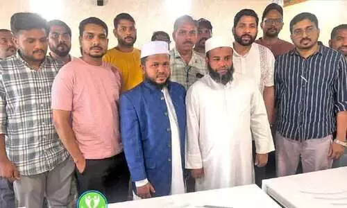 ആ​ലൂ​ർ ഖ​ത്ത​ർ ബ്ര​ദേ​ഴ്സ് ലോ​ഗോ പ്ര​കാ​ശ​നം