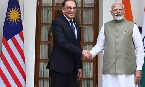Anwar Ibrahim,  Narendra Modi