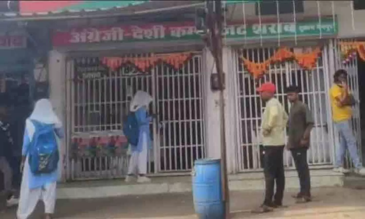 Girls in school uniform try to buy alcohol