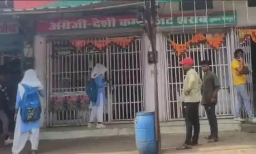 Girls in school uniform try to buy alcohol Girls in school uniform try to buy alcohol