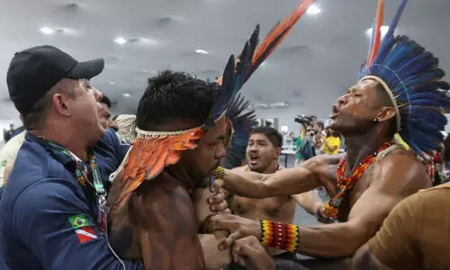 കോ​പ് 30 കാ​ലാ​വ​സ്ഥ സ​മ്മേ​ള​ന​ത്തി​ലേ​ക്ക്  ഇ​ര​ച്ചു​ക​യ​റി പ്ര​തി​ഷേ​ധ​ക്കാ​ർ