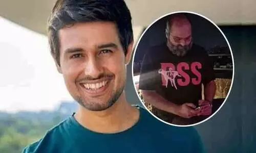 ഈ ടീ ഷർട്ടിൽ ആർ.എസ്.എസ് ആണെന്ന് എന്തിനാണ് ആർ.എസ്.എസുകാർ ചിന്തിക്കുന്നത്? സൂക്ഷിച്ചുനോക്കൂ -കുനാൽ കമ്രയുടെ ചിത്രം പങ്കുവെച്ച് ധ്രുവ് റാഠി