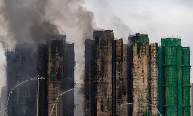 ഹോങ്കോങ്ങിലെ ബ​ഹു​നി​ല കെ​ട്ടി​ട​ങ്ങ​ളി​ലെ തീപിടിത്തത്തിൽ മരിച്ചവരുടെ എണ്ണം 146 ആയി