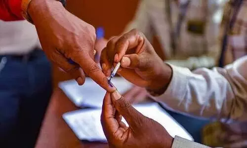 Lower turnout, Covid; Palakkad ,municipality , tough, പാലക്കാട്, കോവിഡ്, വോട്ടിങ്