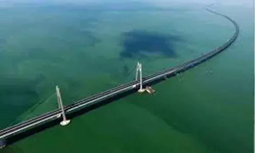 മു​ഹ​റ​ഖ്-​അ​റാ​ദ് പാ​ലം