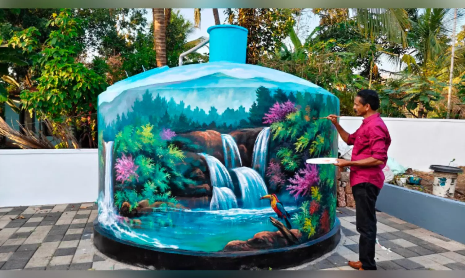 മ​ഴ​വെ​ള്ള സം​ഭ​ര​ണി​യി​ല്‍ ഒ​രു​ക്കി​യ പ്ര​കൃ​തി​ദൃ​ശ്യം ശ്ര​ദ്ധേ​യ​മാ​കു​ന്നു