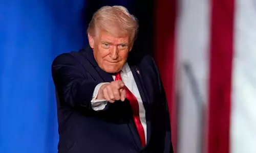 Trumps threat to Iran flaunts armada, cites US militarys Venezuela operation