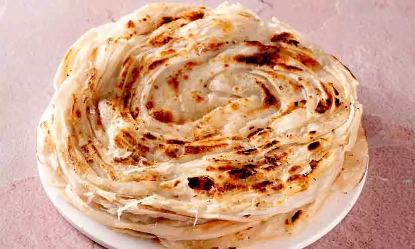 എൽ.പി.ജി ക്ഷാമം; പൊറോട്ടക്ക് വില വർധിപ്പിച്ച് ഹോട്ടലുകൾ എൽ.പി.ജി ക്ഷാമം; പൊറോട്ടക്ക് വില വർധിപ്പിച്ച് ഹോട്ടലുകൾ