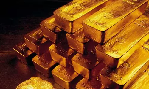 Gold falls on stronger dollar amid renewed U S.Iran tensions