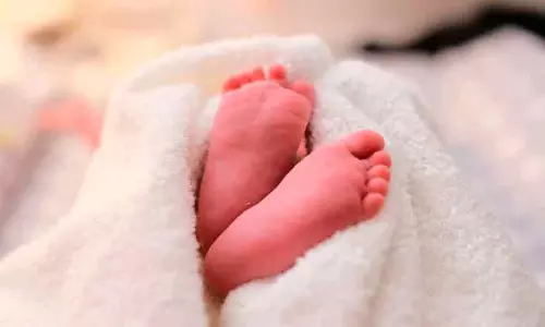 നവജാത ശിശുവിനെ ജീവനോടെ കുഴിച്ചുമൂടിയ നിലയിൽ: രക്ഷകരായി സ്കൂൾ കുട്ടികൾ