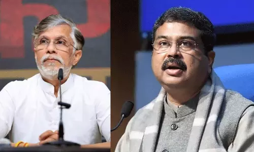 pawan khera, dharmendra pradhan