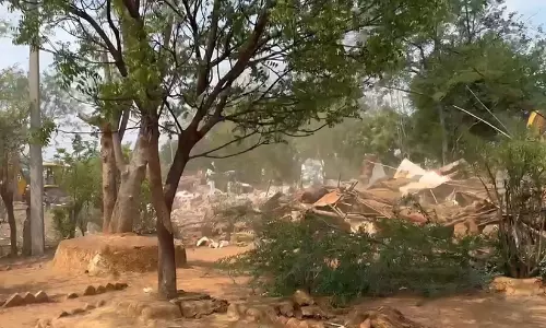 JCB bulldozers flattened more than 80 houses JCB bulldozers flattened more than 80 houses