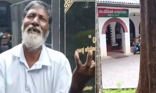 വീട്ടിൽ നട്ടുവളർത്തിയ ചന്ദന മരത്തിന് പണം കിട്ടിയില്ല: ഡിവിഷൻ ഫോറസ്റ്റ് ഓഫിസിനു മുന്നിൽ ആത്മഹത്യാ ഭീഷണി മുഴക്കി കർഷകൻ