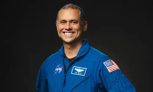 Dr Anil Menon