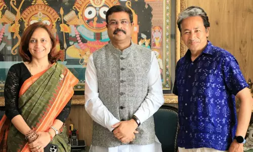 Sonam Wangchuk and his wife Dr. Geetanjali J. Angmo with Union Education Minister Dharmendra Pradhan