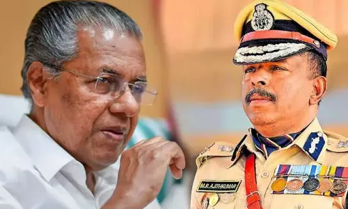 Pinarayi Vijayan, M.R. Ajith Kumar
