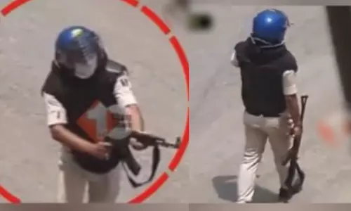 AK-47 against protesters