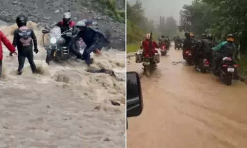 വെള്ളപ്പൊക്കത്തിൽ തുഴഞ്ഞ്, മണ്ണിടിച്ചിലിൽ ചികഞ്ഞ് അസം സംഘത്തിന്‍റെ ബൈക്ക് റൈഡിങ്; നാഗാലാൻഡിൽ നിന്നുള്ള വീഡിയോ വൈറൽ