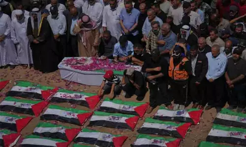 Thousands of Palestinians attend the funeral in Gaza